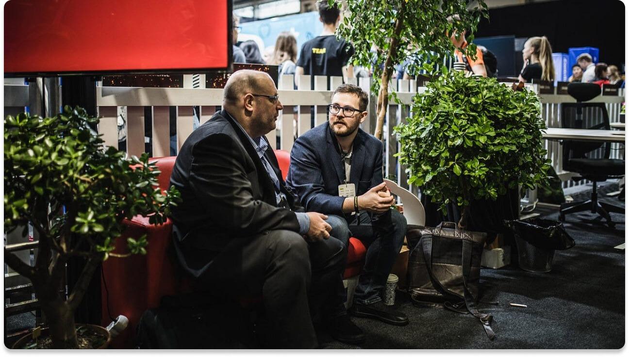 Entrepreneurs networking at an event