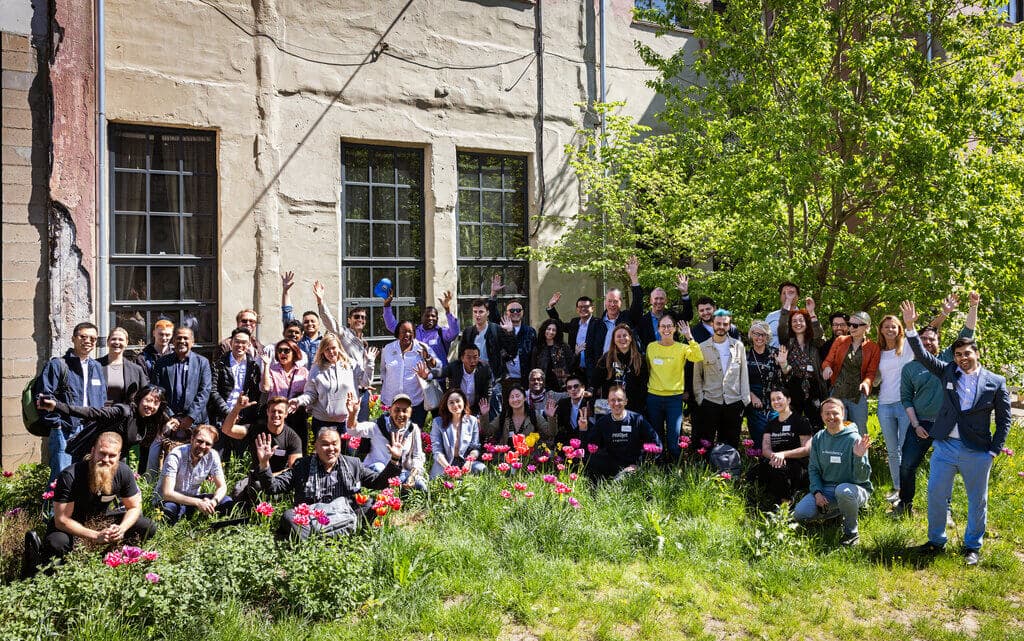 Group shot outside in the garden of participants at the e-Residency study trip for startup entrepreneurs in 2024