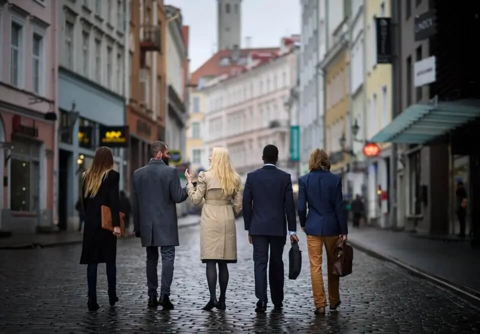 Business people walking in Tallinn old town