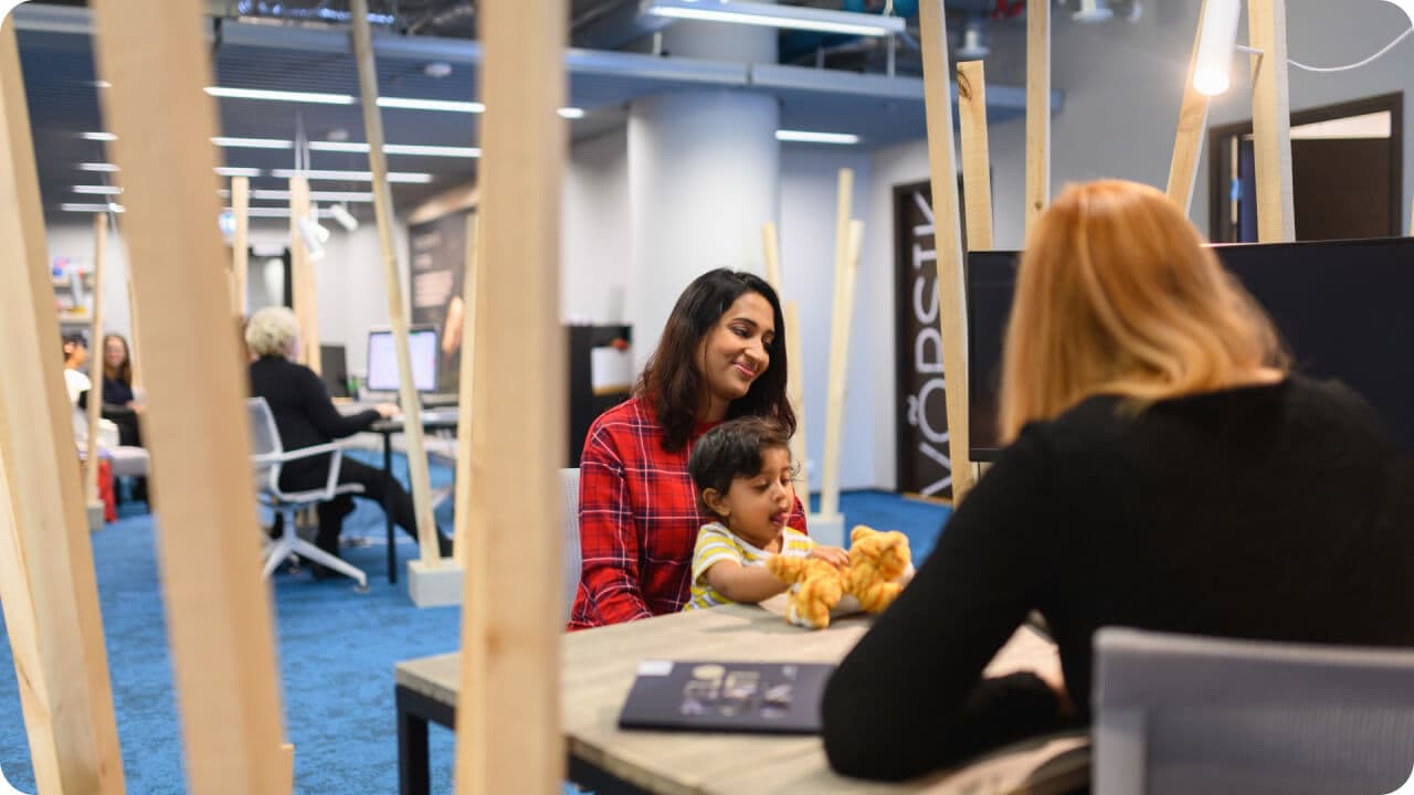 Woman and her kid at business consultation
