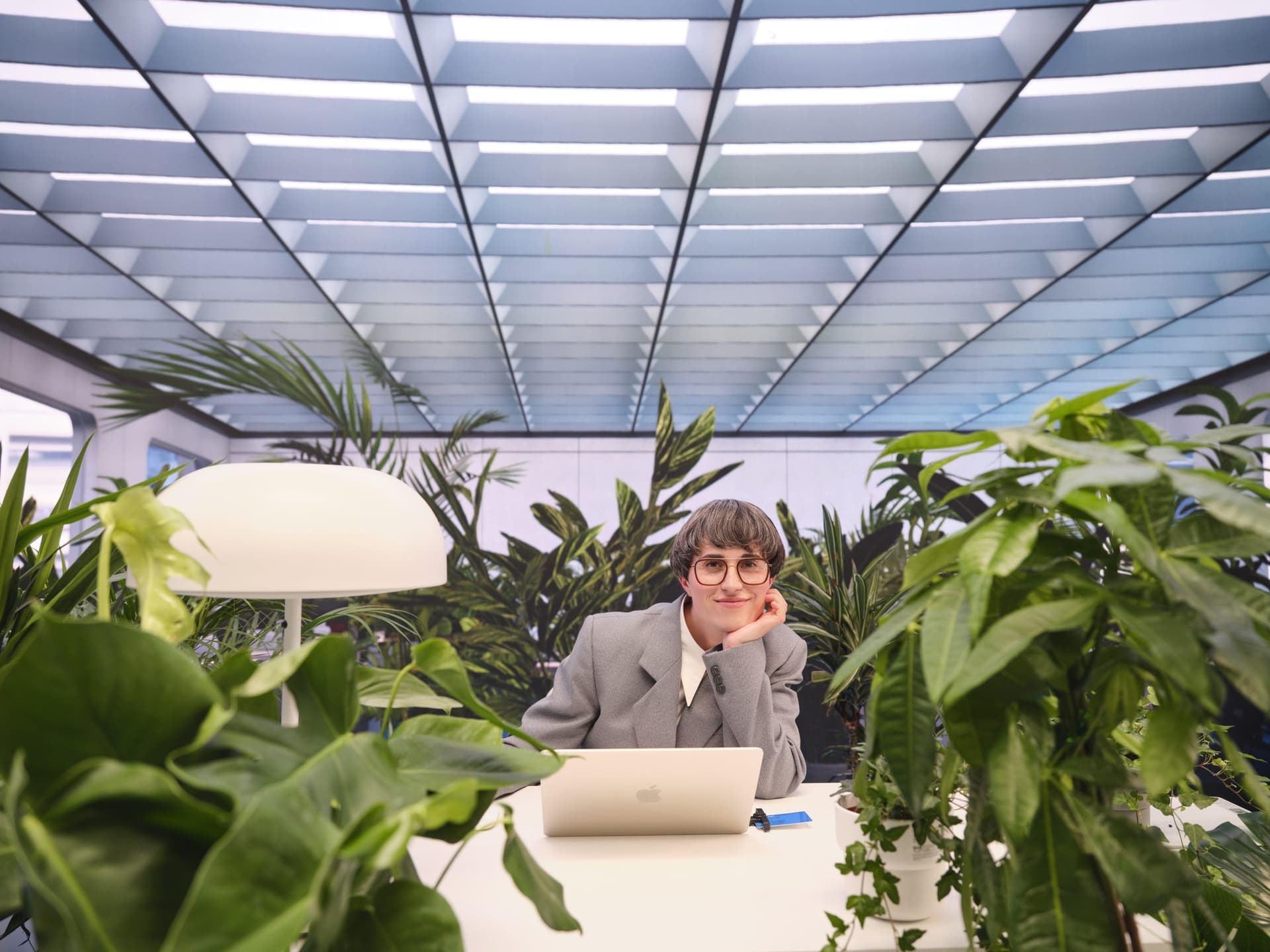 e-resident with plants and laptop
