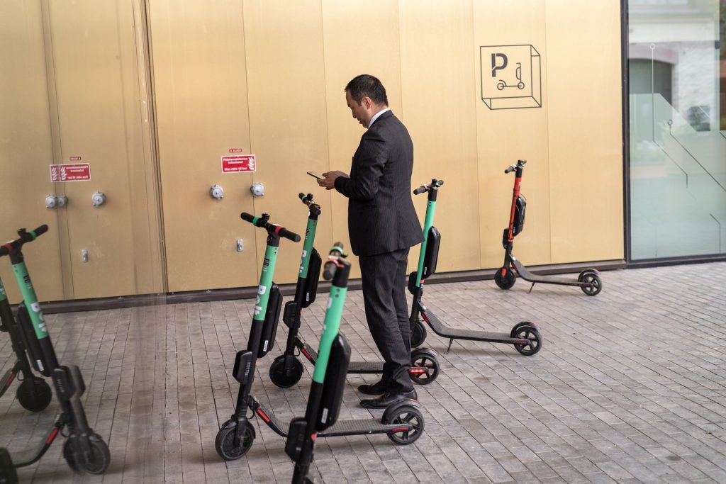 Man booking an electric scooter