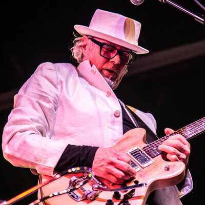 Simon Campbell rocking his guitar at the 2022 Great British Rock and Blues Festival