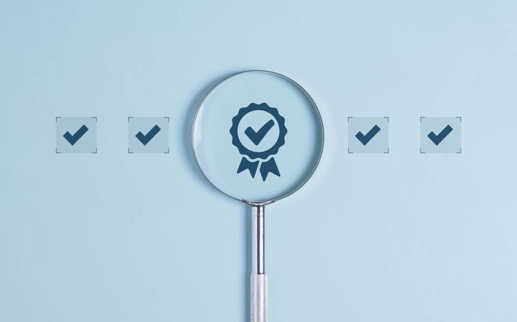 Magnifying glass identifying the Estonian accounting quality standard