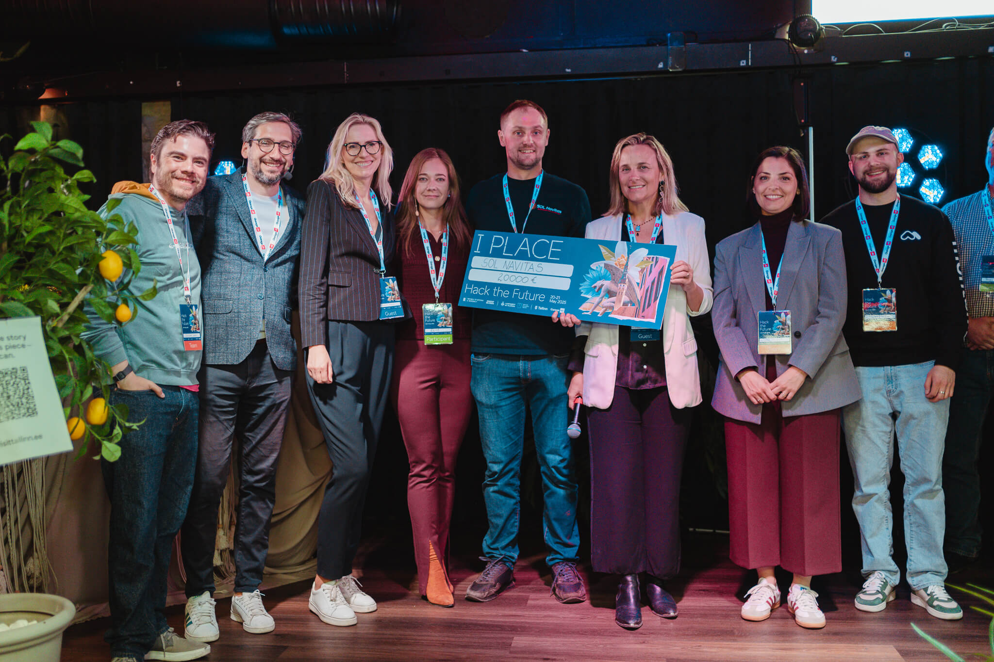 The winning hackathon team Sol Navitas poses with their prize