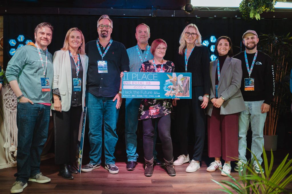 The Remote Resilience Hub team receiving their second place prize in Hack the Future