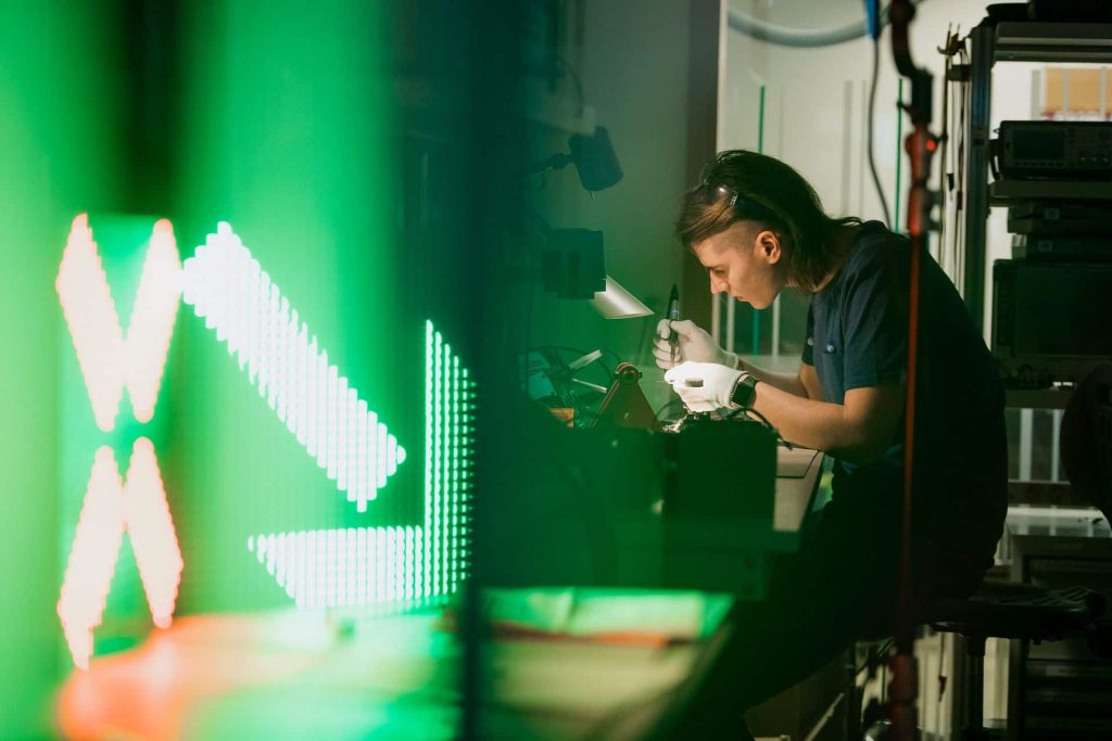 An engineer works in a lab