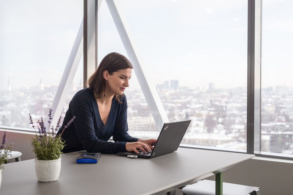 A woman working on a laptop