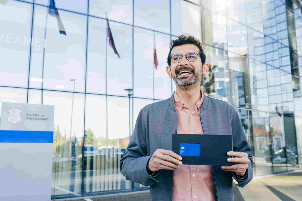 Pepe Villatoro, founder of Fuckup Nights, poses with his new e-Residency card