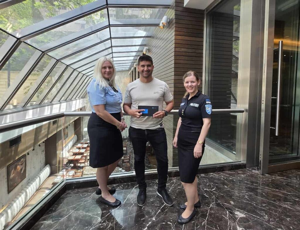 Merike Aspe-Kangro and Kristi Saavaste of the Estonian Police and Border Guard Board with a new e-resident in Buenos Aires